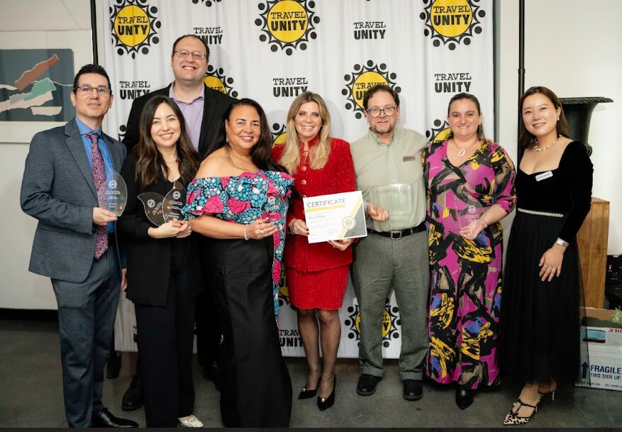group of people holding awards and certificate