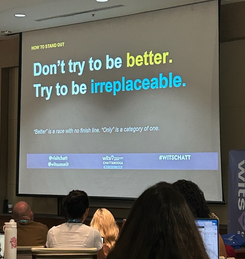 WITS presentation slide reading, ‘Don’t try to be better. Try to be irreplaceable.’